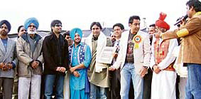 Jasbir Jassi, Inderjit Nikku, Babbu Mann, Sarbjit Cheema and Chacha Raunki Ram, at Chee- ma Kalan village on Tuesday.