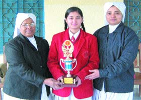 Rupinder Kaur Dhot being felicitated on her return to the school