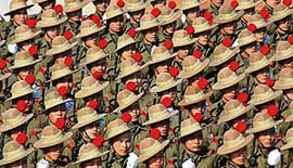 Men of the Gorkha Regiment march during the full-dress rehearsal for the 59th Republic Day parade in New Delhi on Wednesday.