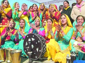 Participants of the Republic Day function carry out full dress rehearsal in Amritsar on Friday.