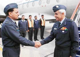 Air Marshal Gautam Nayyar (right), Air Officer Commanding-in-Chief, Maintenance Command, is received by Air Officer Commanding 3 BRD, Air Cmde S.C. Luthra on his arrival in Chandigarh
