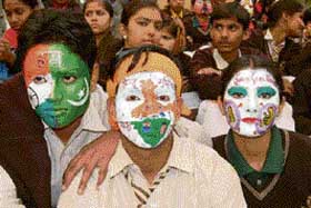 Students take part in a face-painting competition at the Surajkund Crafts Mela.