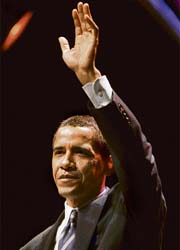 Barack Obama waves to supporters at the Virginia Democratic Party Jefferson Jackson dinner in Richmond, Virginia