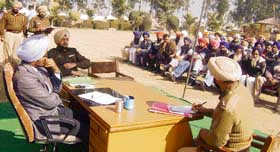 SSP Sangrur Arun Pal Singh convenes a police-public meeting at Malikpur near Ahmedgarh on Saturday.