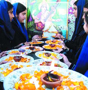 School students perform Saraswati Vandana to celebrate Basant Panchami in Amritsar.