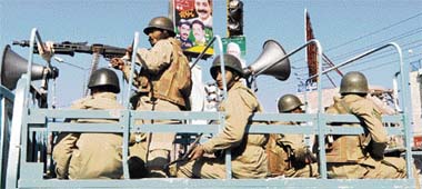 Pakistani troops patrol a street in Rawalpindi
