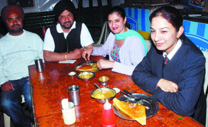 An NRI family enjoys South Indian delicacies at Vrindavan in Jalandhar.