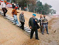 Led by Irrigation Minister, Punjab, Janmeja Singh Sekhon, officials of the Canals Department inspect the reconstructed first Patiala Feeder canal at Dhamot village in Ludhiana district.