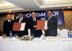 (From left to right) G.P Savlani, resident director, CREDAI, Pradeep Jain, president, CREDAI-NCR and chairman, Parsvnath Group, Prof K.K Aggarwal, Vice-Chancellor and V.K Jain, Registrar of Guru Gobind Singh Indraprastha University, after the signing of MoU to start real estate courses