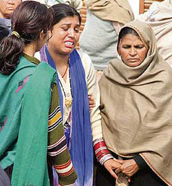 Sachin Bahris sister Ritu being consoled by relatives on Saturday.