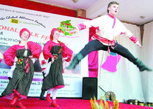 Artistes from Russia present a dance item during Amritsar International Folk Festival.