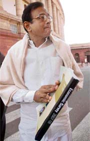 Finance minister P. Chidambaram outside Parliament building to speak to mediapersons on the economic survey in New Delhi