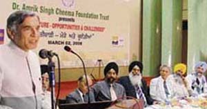 Union minister of state for finance Pawan Kumar Bansal addresses dignitaries at a seminar at PAU, Ludhiana, on Sunday.