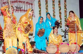 Students of the Sarup Rani Government College for Girls present a musical show with various traditional instruments in Amritsar