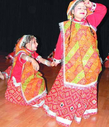 Students of Sri Guru Harkishan Public School perform during their annual day function.
