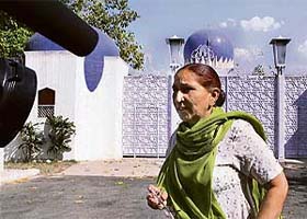 Dalbir Kaur, sister of Sarabjit Singh, comes out of the Pakistan High Commission in New Delhi on Tuesday after submitting a clemency plea to Pakistan President Pervez Musharraf