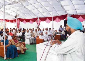 Haryana agriculture minister Harmohinder Singh Chatha addresses timber merchants after bhumi pujan for setting up a modern timber market in Yamunanagar