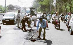 A road being repaired during heavy traffic hours in Ludhiana