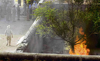Inmates of the Central Jail set some junk on fire to protest against the poor facilities in the prison in Jalandhar on Sunday.