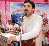 Karnail Rana, a well-known Himachali folk artiste performs at Himachal Bhawan in Ludhiana on Sunday.