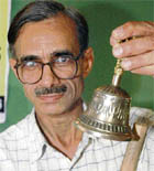 Dr K.S. Upadhaya displays physics concepts during a press briefing at Chandigarh Press Club, Sector 27, on Wednesday.