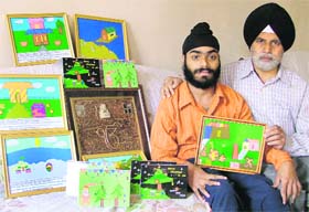 Ludhiana-based Gagandeep Singh with his collection of computer-generated paintings