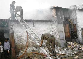 Fire-fighters try to douse the flames after a fire broke out at an edible oil factory in Industrial Area, Phase I, Chandigarh