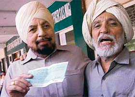 Prem Singh (left) who got Rs 11.5 crore as compensation for his land in Jherorheri village in Mohali