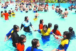 With mercury hitting north, residents take a refreshing dip at a water park near Jalandhar