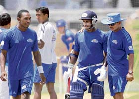 Dwyane Bravo (L) and Sanath Jayasuriya (C) hold key to the fortunes of buoyant Mumbai Indians when they clash with Rajasthan Royals in the T20 IPL match at the D Y Patil Stadium in Mumbai