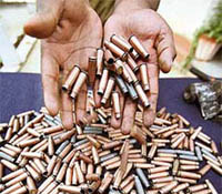 A BSF jawan displays empty cartridges in Jammu on Friday.