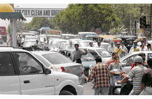Traffic goes haywire during a power cut at Bhai Bala Chowk in Ludhiana on Friday.