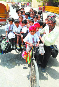 Overloaded school rickshaws pose a serious threat to the safety of kids.