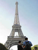 Hold hands and enjoy a leisurely walk around the Eiffel Tower in Paris.