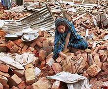 Searching for life under rubble at Fahrukh Nagar in Gurgaon on Sunday. 