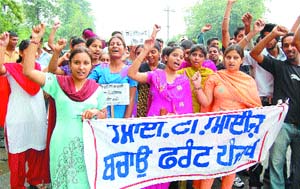 Students and staff of various ITIs organise a rally against the ‘privatisation move’ of the state government in Amritsar on Tuesday.