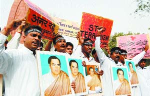 Members of the ST/SC cell of the PPCC organise a rally against terrorism on the eve of the martyrdom day of former Prime Minister Rajiv Gandhi.
