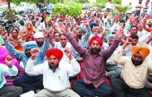 Members of the Government School Sikhya Bachao Manch, Punjab, organised a dharna in front of the office of deputy commissioner in protest against the election duties given to them in far-flung areas. The members demanded that teachers should be exempted from any non-education duties Sital Singh, convener, addressed the gathering.