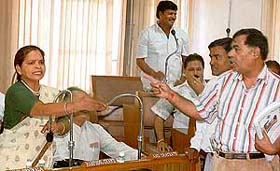 Councillor Kamlesh makes a point during a heated debate with councillor Jatinder Bhatia at the general house meeting of the Municipal Corporation in Chandigarh