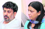 Rajesh Talwar and Nupur Talwar. Nupur was detained for questioning.