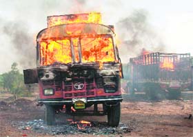 A truck burns after it was set ablaze by Gujjars during clashes with the police in Dausa