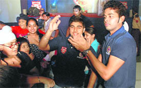 Kings XI Punjab players dance during a party at hotel Mountview on Tuesday night in chandigarh.