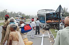 Passengers of a private bus en route Vaishno Devi had a miraculous escape when their vehicle hit the road divider at Liddran village on the Jalandhar-Amritsar road on Tuesday.