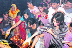 Devotees offer prayers on the occassion of Shani Jyanti at Sector-20 temple in Chandigarh