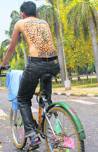 A volunteer painted his back to spread the save earth message on the occasion of World Environment Day on the Panjab University campus on Thursday.