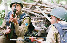 Jawans during an encounter in Shopribagh village on the outskirts of Srinagar on Sunday.