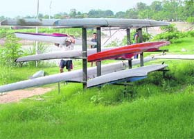 Rowing boats of the Water Sports Lake Club being shifted to near deep waters of the Sukhna Lake in Chandigarh