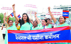 Members of the National No Pasina Commission (NNPC), a voluntary organisation, take out a rally to spread awareness on women rights in Amritsar