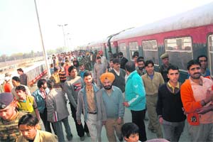The Nowgam railway station in Srinagar bustles with activity during the trial run of the train