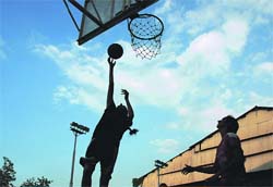 Sky is the limit: Basketball players of the Baba Lothiana Academy during a practice session at Guru Nanak Stadium in Ludhiana.